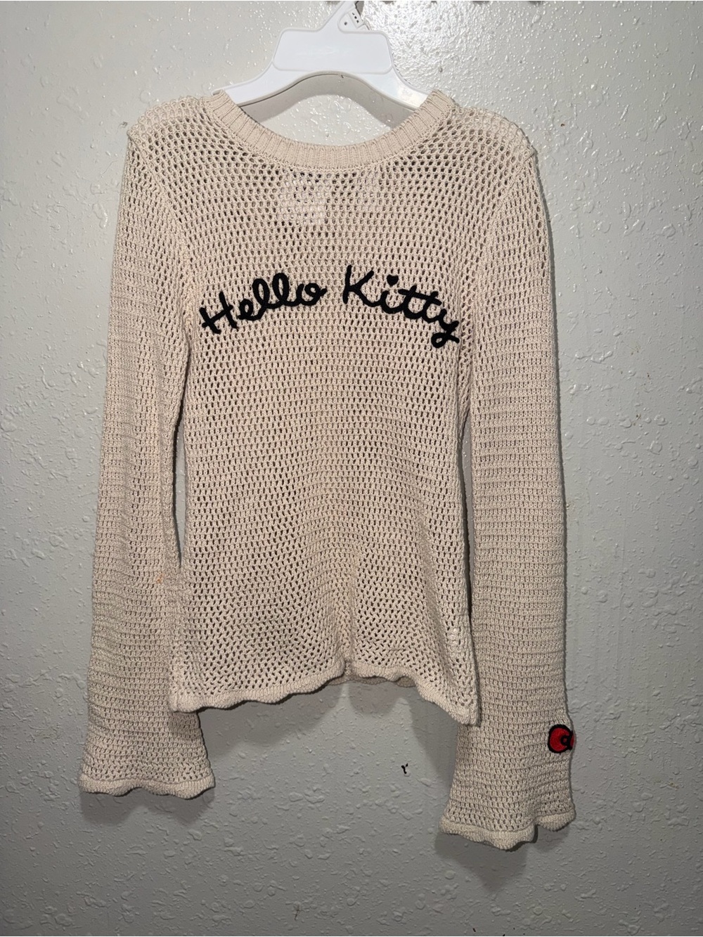 Hello Kitty Cream Open-Knit Scoop Neck Sweater with Black Script
